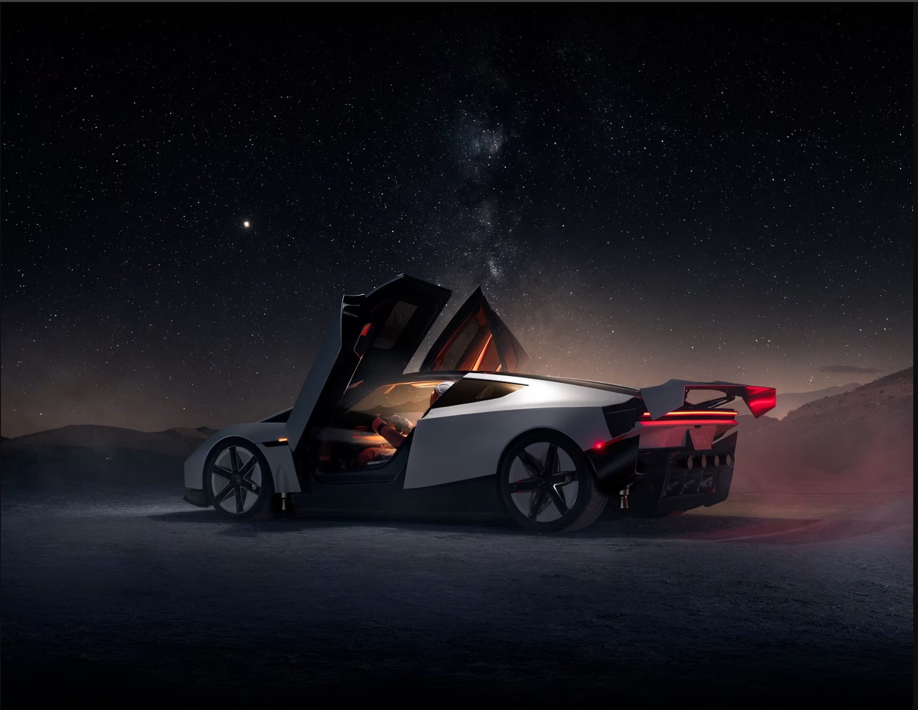 Roadster beneath a night sky